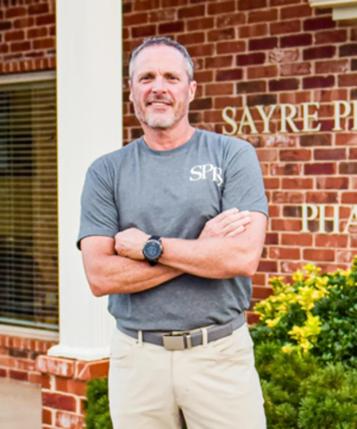 Eddie Lakey outside Sayre Professional Pharmacy.