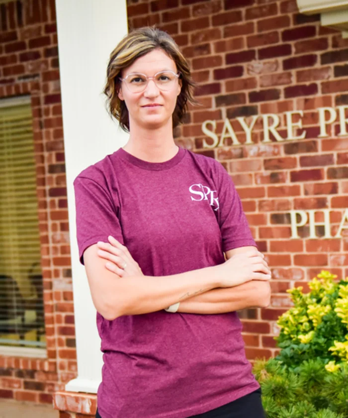 Joni Wimberly outside Sayre Professional Pharmacy.