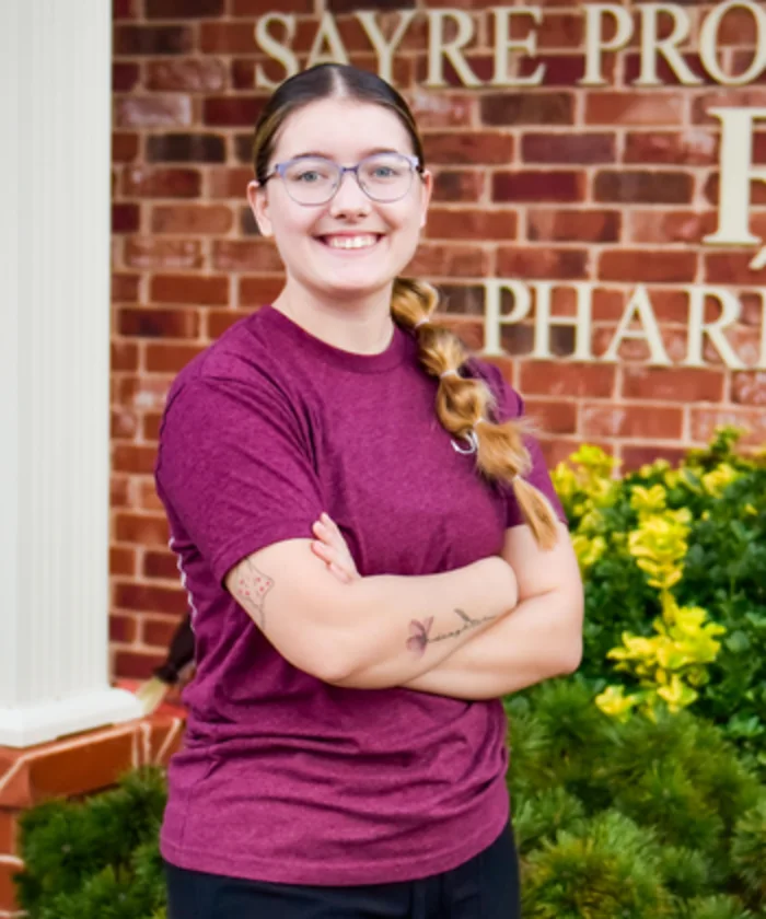 Ryleigh Bertrand outside Sayre Professional Pharmacy.